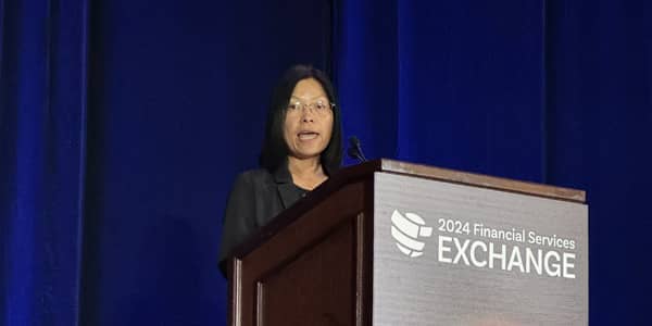 Woman speaking at podium