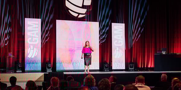 Internal Audit leader on stage at a global conference