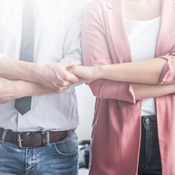 two people holding hands