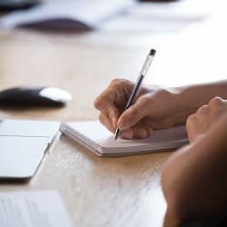 writing on notepad