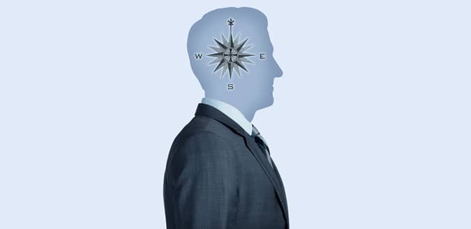 business man with compass in head